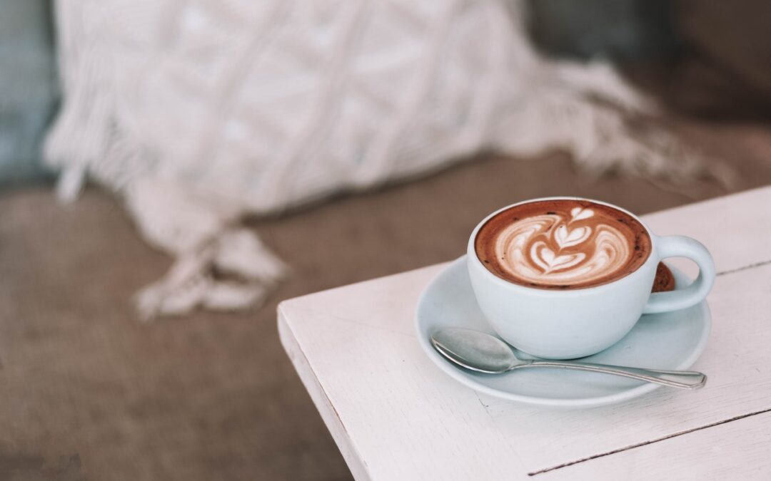 Cappuccino on a bedside table