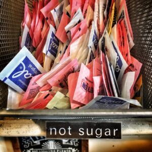 Sugar substitute packets in a basket